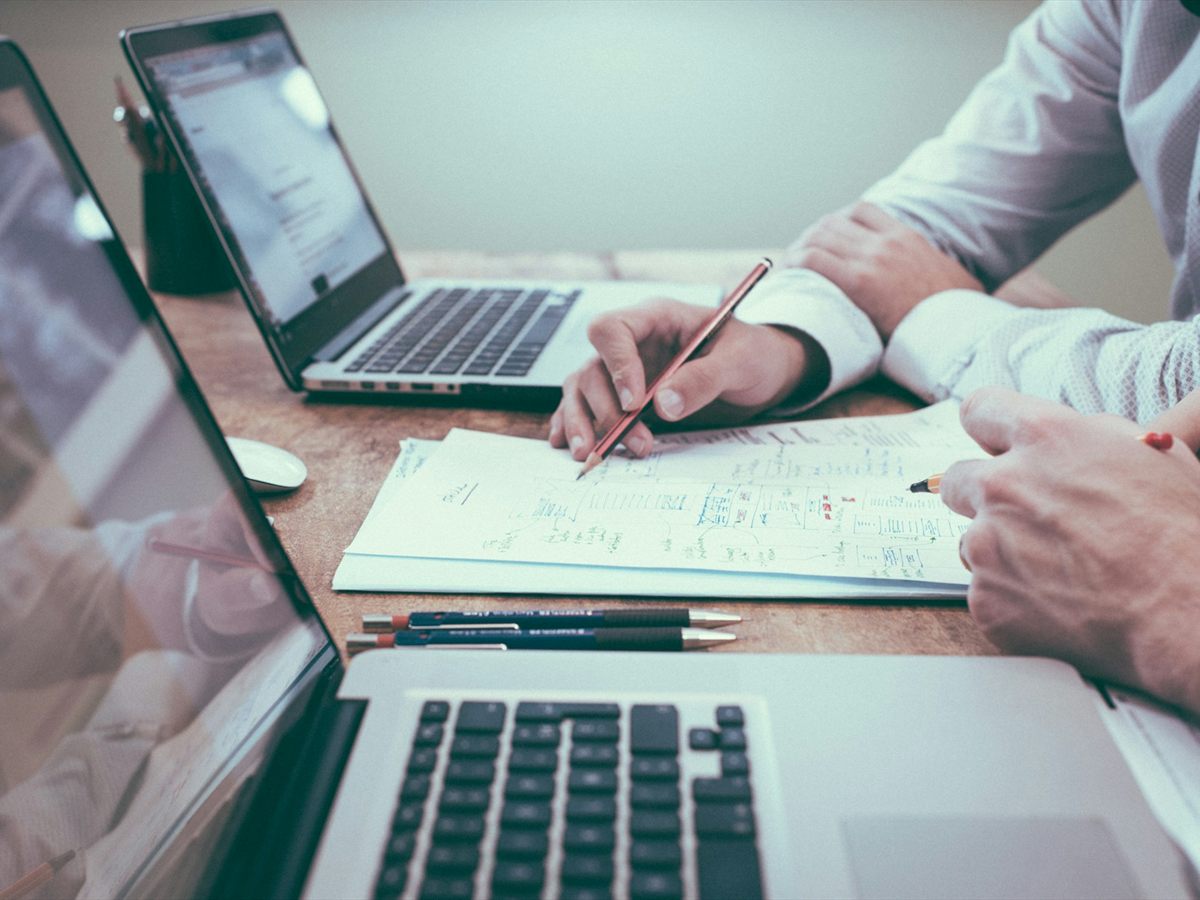 Managers reviewing financial reports